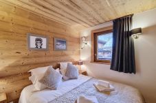 Townhouse in Les Gets - Chalet Raksha -appartement-8pers-Proche piste