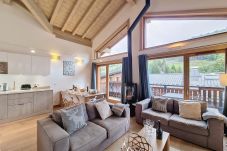 Townhouse in Les Gets - Chalet Raksha -appartement-8pers-Proche piste